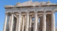 Ancient Greek marble pillars showing signs of weathering.